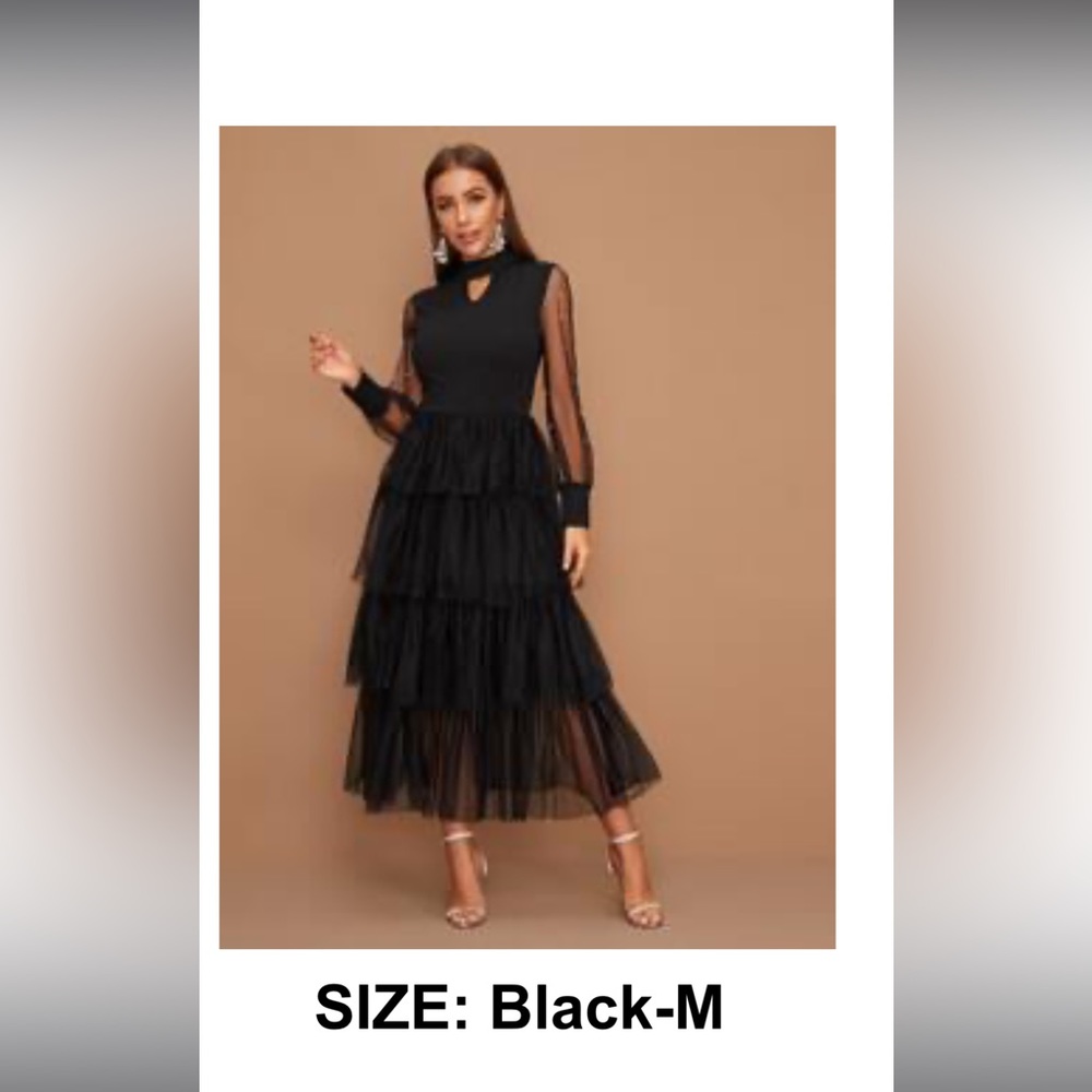 Beautiful black dress size M. Mesh sleeves with pearls.
